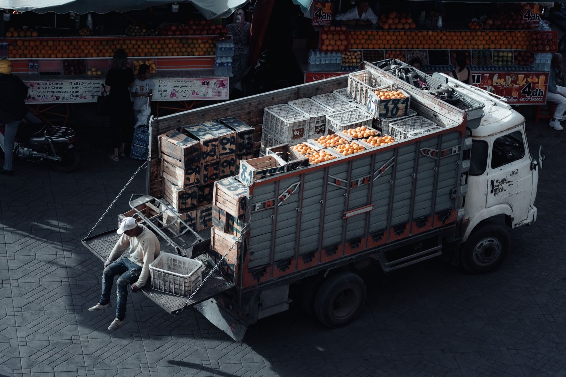 Fresh produce packed in crates on a commercial vehicle